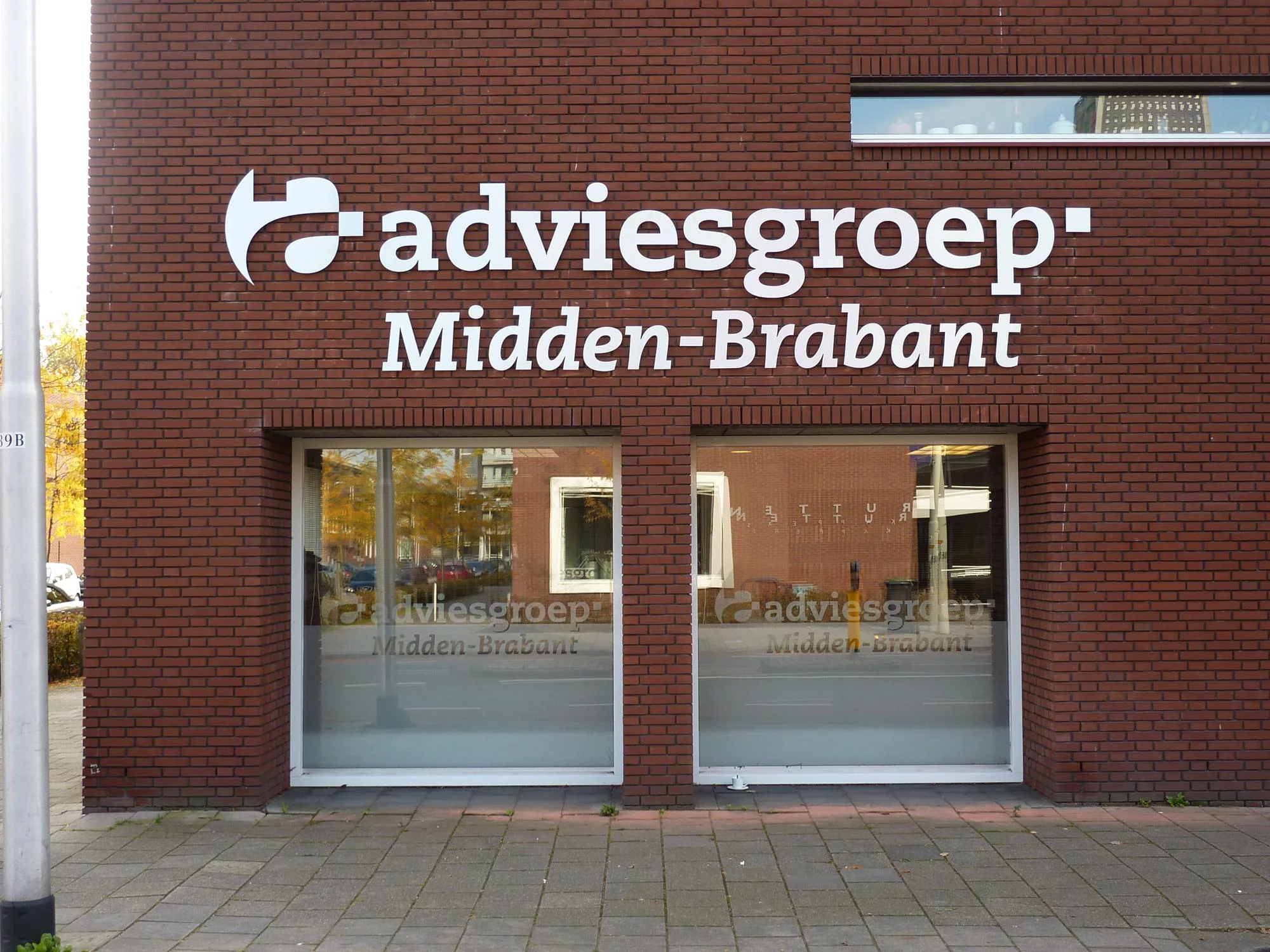 sign stickers vlaggen beachflag freestekst gevelreclame frames spandoeken spandoek